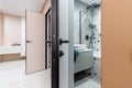 White open bathroom door in the new apartment Royalty Free Stock Photo