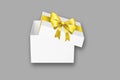 White open gift box with yellow ribbon bow mockup Royalty Free Stock Photo