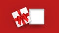 White open square gift box decorated with red ribbon tied bow on red background. Top view. Royalty Free Stock Photo