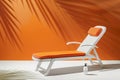 White and orange beach chair with a bottle of sunscreen. Generative AI