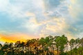 White, orange, blue and dark clouds on sky on the sunset summer background Georgia, US Royalty Free Stock Photo
