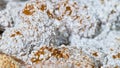 White and orange clusters of crystals on aragonite mineral in texture detail