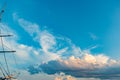 White, orange and dark clouds with blue sky on the sunset summer background Royalty Free Stock Photo