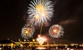 White and orange fireworks over the Saint-Lawrence River Royalty Free Stock Photo