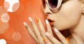 White orange manicure and makeup . Royalty Free Stock Photo