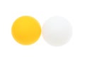 White and orange ping pong ball on a white