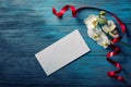 White Orchid and envelope on a blue wooden Royalty Free Stock Photo