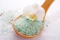 White orchid flower with blue mineral bath salt