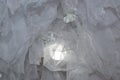 White organza fabric folded in folds, background
