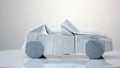 White origami car model.