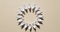 White origami cranes arranged in a circular pattern Royalty Free Stock Photo