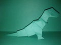 White origami dinosaur t-rex paper art