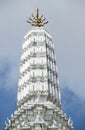 White ornate tower of buddhist temple Wat Phra Kaew, Bangkok