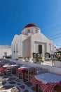 White orthodox church and small bell tower in Mykonos, Cyclades Islands, Greece