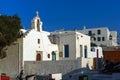 White orthodox church and small bell tower in Mykonos, Greece