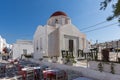 White orthodox church and small bell tower in Mykonos, Greece