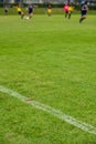 White outline for a football field for a Girl`s Under 15 years school soccer tournament.