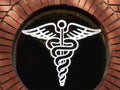 White outline medical symbol in round window