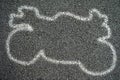 White outline of motorcycle on the Road