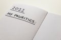 Blank page of diary with text `2022 my priorities`. Royalty Free Stock Photo