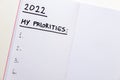 Blank page of diary with text `2022 my priorities`. Royalty Free Stock Photo