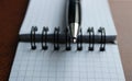 Macro Shot Of Ballpoint Pen Lying On A Bound Paper Notebook Royalty Free Stock Photo
