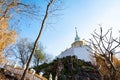 White pagoda with stair walkway at Tham Phra Sabai temple