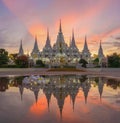 White pagoda or stupa of Asok Maharat buddhist Temple at sunset, Samut Prakan Province, Thailand. Thai architecture. Tourist Royalty Free Stock Photo