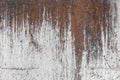 White paint abstract pattern on the surface of an old rusty metallic texture steel background rust brown Royalty Free Stock Photo