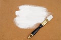 White paint, brush and veneer sheet Royalty Free Stock Photo