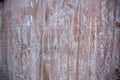 White paint comes off the old wood. close up background. Royalty Free Stock Photo