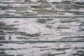 White paint peeling off over wooden surface Royalty Free Stock Photo