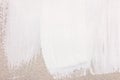 White painted background with brush strokes on gray paper Royalty Free Stock Photo