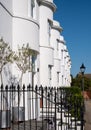 White painted Grade II listed Georgian town houses in the Guildford Lawn conservation area, in Ramsgate, Kent UK. Royalty Free Stock Photo