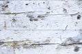 White painted old cracked wood background. Grungy and weathered white grey painted peeling wooden wall plank texture background Royalty Free Stock Photo