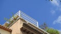 White painted roof terrace surround with pigeon spikes Royalty Free Stock Photo