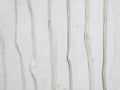 White painted wooden texture background. Rough uneven wooden vertical boards