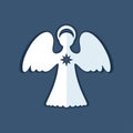 White paper angel with a christmas star on a dark blue background.