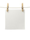 White paper attached to a rope clothespin Royalty Free Stock Photo