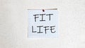 White paper on the white background with text Fit Life Royalty Free Stock Photo