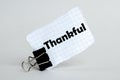 White paper on the white background with text Thankful Royalty Free Stock Photo