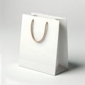 White Paper Bag Mockup with brown rope handle on a white background. Blank Paper Shopping Bag on a white background surface Royalty Free Stock Photo