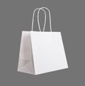 White paper bag, shopping parcel, packet with handles isolated Royalty Free Stock Photo