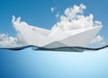 White paper boat floating. Royalty Free Stock Photo