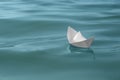 White paper boat floating on water surface, space for text Royalty Free Stock Photo