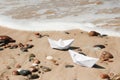 White paper boats.