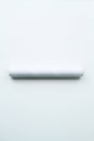 White paper, carboard tube in isolated white background