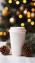 White paper coffee cup with christmas tree on bokeh background Royalty Free Stock Photo