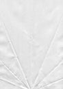 white paper flip textured white sheet of paper with realistic curled under warm incandescent Royalty Free Stock Photo