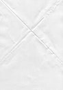 white paper flip textured white sheet of paper with realistic curled under warm incandescent Royalty Free Stock Photo